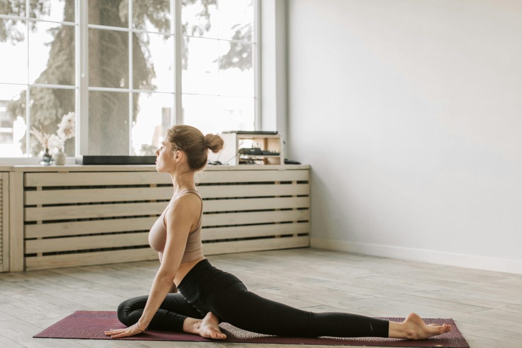 lady doing yoga practicing self care